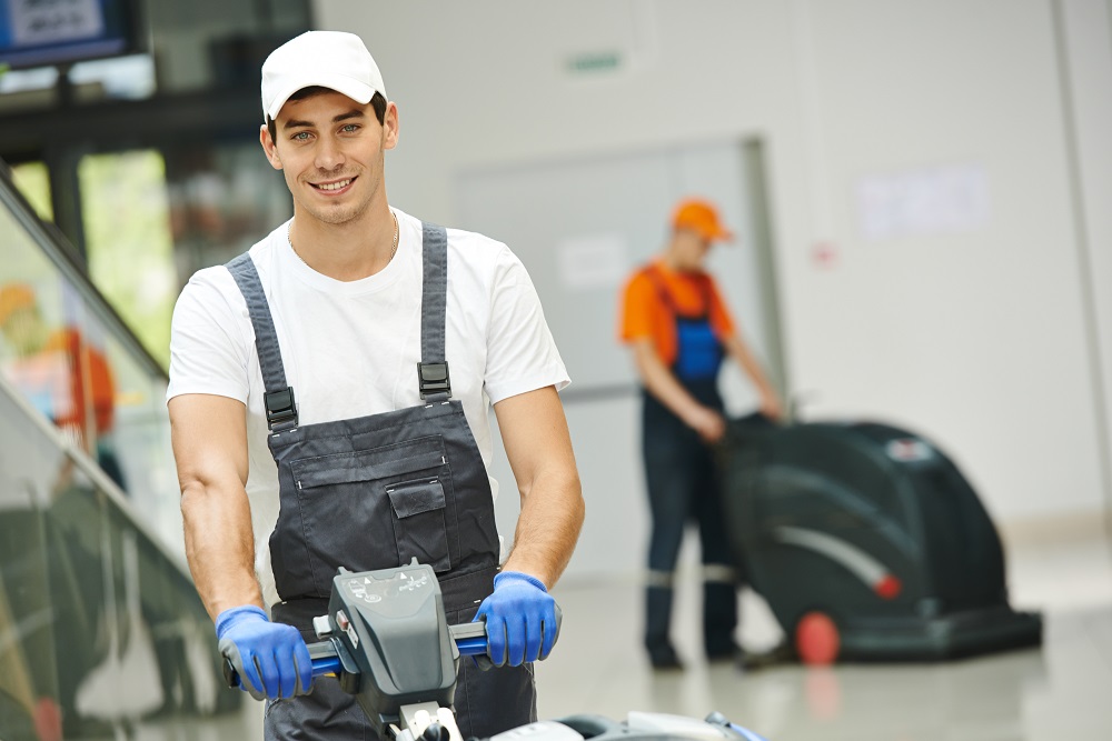 Squeaky Clean | Male Workers using heavy duty cleaning equipment shows the need for Inland Marine Insurance. | Janisure