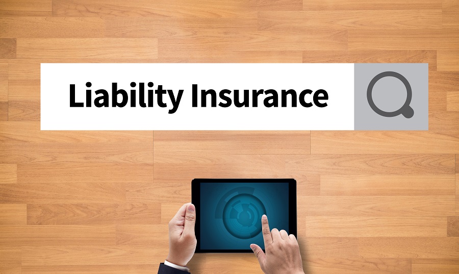 Business General Liability Insurance on a tablet.
