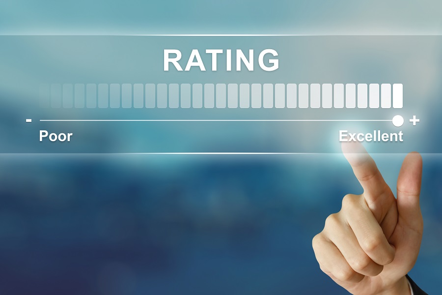 A hand clicking excellent rating on virtual screen to symbolize a businesses experience modification rating. 